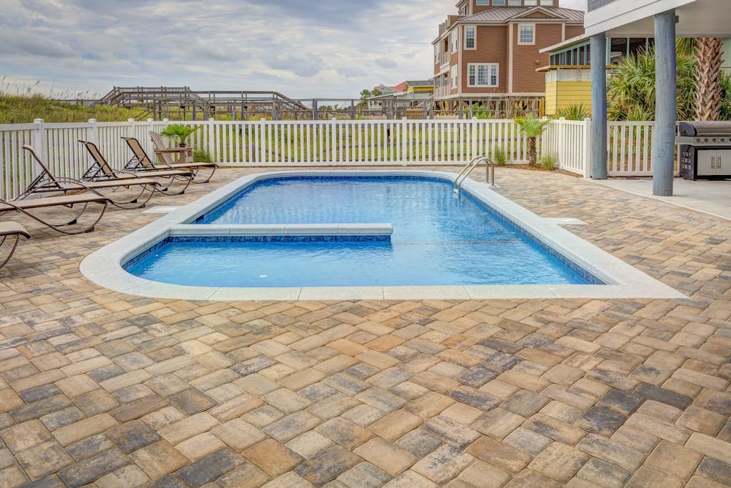 Photography of Pool Near Fence